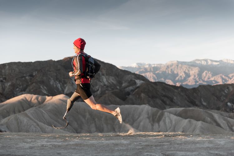 man running in mountains